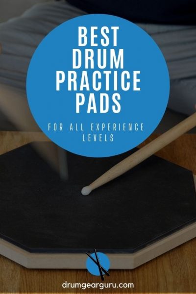 a drum practice pad with a man striking it with sticks